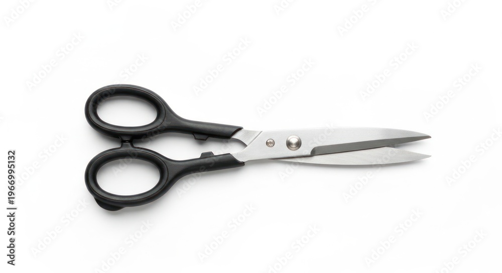 Fototapeta premium Scissors with black handles on a white background.