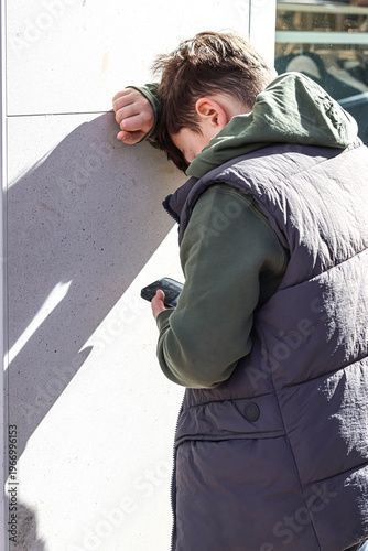 Concept of Depression, bullying through the mobile. Danger of social networks