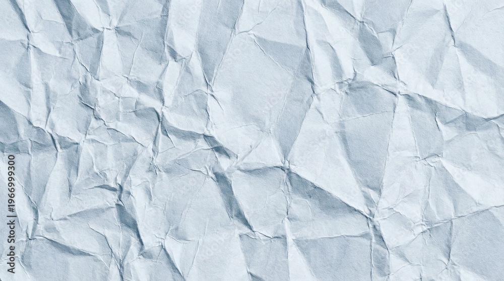 Fototapeta premium Intricate crumpled white paper texture with sharp diagonal creases and subtle blue-grey highlights