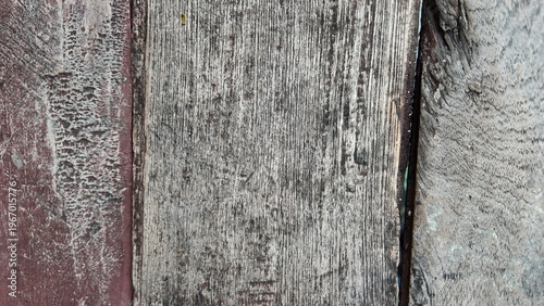 Textured close up of weathered wooden planks showcasing intricate grain patterns and faded colors