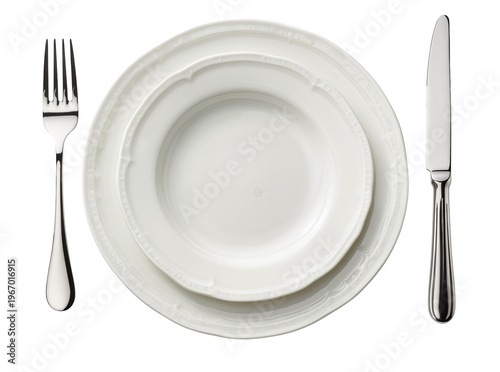Billede på lærred Elegant dining place setting with two stacked white ceramic plates, a silver for