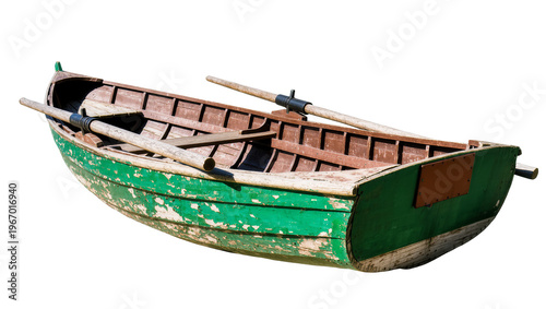 Photography Isolated old green wooden rowboat with peeling paint and oars, vintage tradition