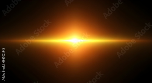 Vibrant yellow light flare on dark background with lens flare effect