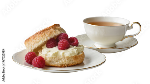 Foto Creamy scone with fresh raspberries and tea, isolated on transparent background