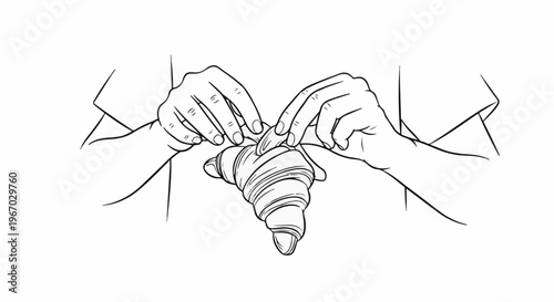 Hands delicately tearing a flaky croissant with cream filling