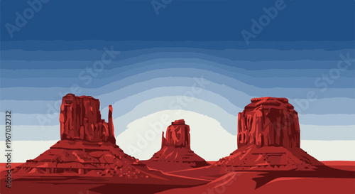 Red desert mesas under a layered blue sky