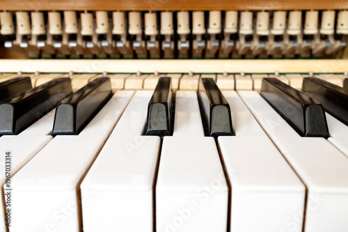 Piano keyboard close up with visible mechanism musical instrument detail sound and craftsmanship