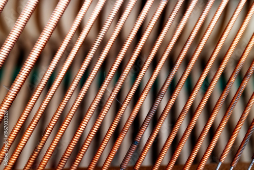 Piano mechanism close up abstract background wooden hammers texture musical instrument detail design