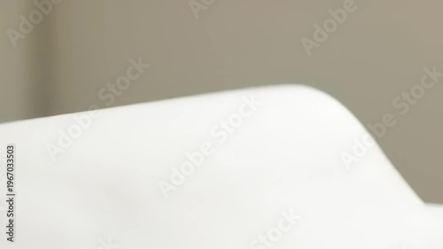 Closeup of white toilet bowl.