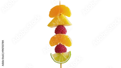 Quadro su tela Fresh fruit skewer with orange pineapple raspberry and lime slices, isolated on