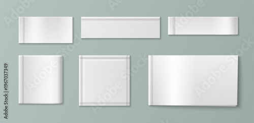 White fabric label mockup with realistic woven texture. Blank cotton tag sewn on cloth garment with detailed stitching, vector set isolated on background. Brand identity and apparel design product