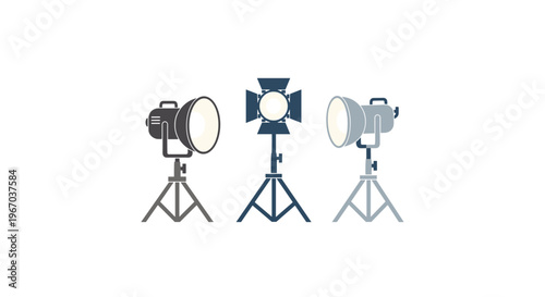 Three different professional studio lights on adjustable tripods are isolated on a clean white background.