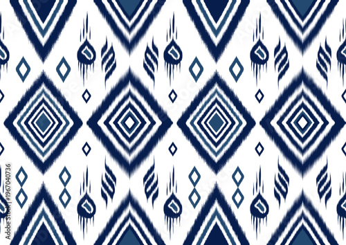 Indigo and White Ethnic Ikat Seamless Pattern with Geometric Rhombus Shapes
