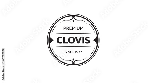 Badge emblem with the text CLOVIS PREMIUM SINCE 1972 in a circular black border with decorative elements