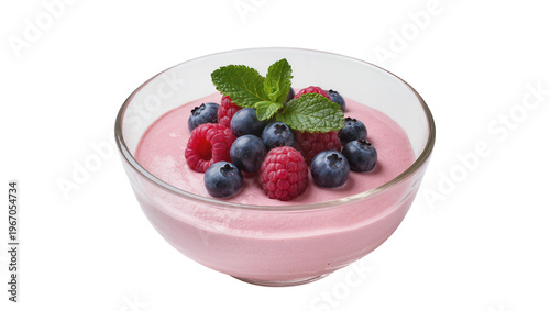 Pink berry mousse topped with fresh raspberries blueberries and mint leaves, isolated on transparent background