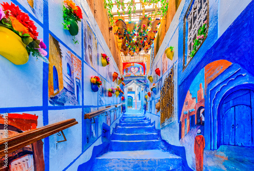 Chefchaouen, Morocco. Blue medina, ancient city, colourful flowerpots.