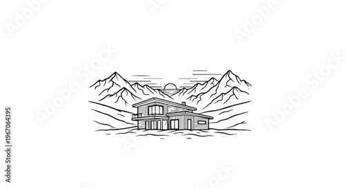 Modern home nestled in a dramatic mountain range at sunset