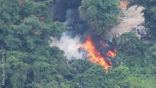 Big fire on a dump in the middle of the city in Kuala Lumpur Malaysia