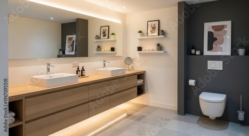 Modern bathroom featuring sleek vanity and stylish toilet setup with minimalist decor