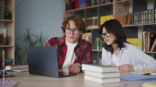 Diverse students studying together in a university library