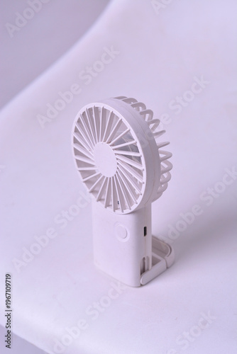 White Portable Handheld Fan Close-Up on White Background
