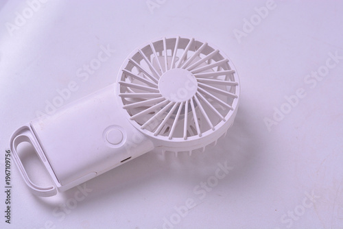 White Portable Handheld Fan Close-Up on White Background