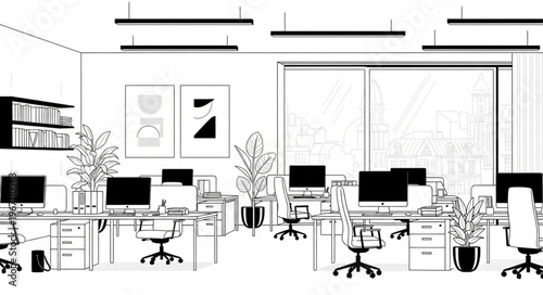Modern open plan office interior with desks and computers.