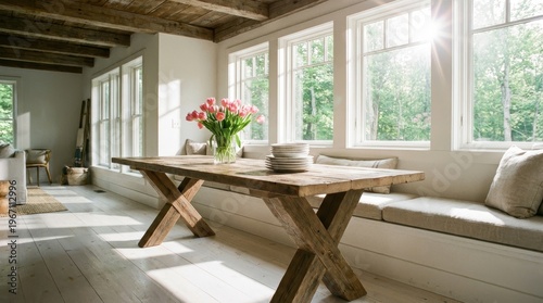 Bright And Inviting Dining Area With Rustic Wooden Table And Fresh Flowers Bathed In Sunlight