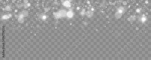 Soft white light glows across a dark background, creating a dreamy bokeh effect with sparkling particles and subtle radiant highlights.