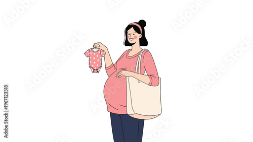 Pregnant woman in a pink sweater holds up a small baby outfit while smiling happily and carrying a large tote bag.