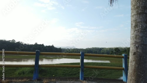 Murky water in a dam area showing sediment and low clarity. The scene highlights environmental conditions and water quality in a reservoir setting.