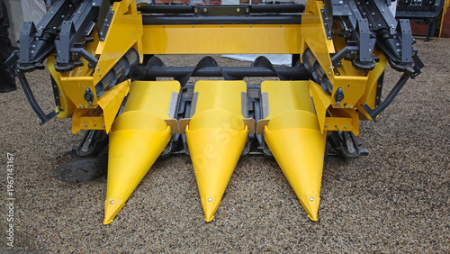Photography Corn Harvester Head With Three Yellow Blades Attachment