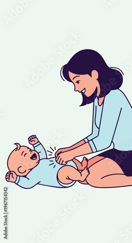 A happy mother playing with her laughing baby while sitting on the floor together