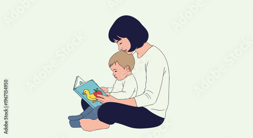 A mother sits with her young child and reads a small book with cute pictures