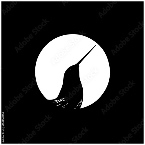 A bird in front of a full moon