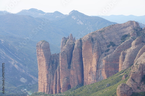 Mallos de Riglos rock formations in Huesca, Spain with dramatic cliffs and blue sky
