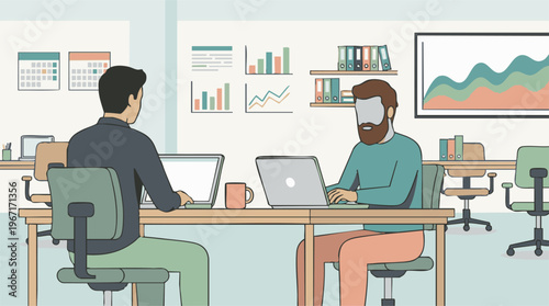 Business professionals working on laptops in a modern office environment