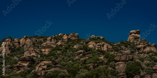 Photography Rocky Landscape with Boulder Formations Against Clear Blue Sky