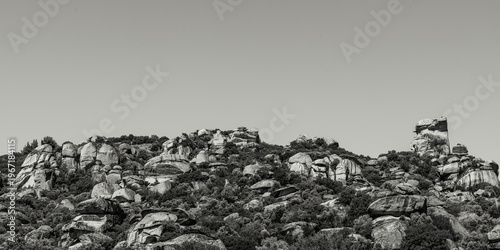 Tableau sur toile Rocky Landscape with Boulder Formations Against Clear Blue Sky