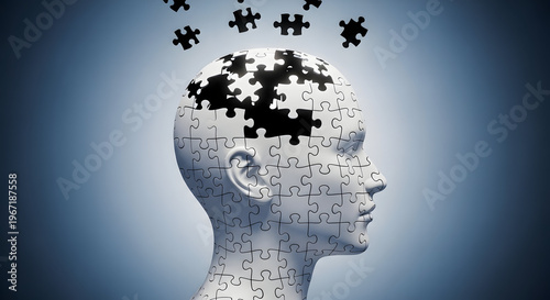 A thought provoking image of a human head composed of puzzle pieces with some pieces floating away