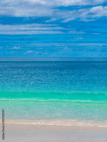 Those colors! A beautiful beach off the coast of Praslin Island.