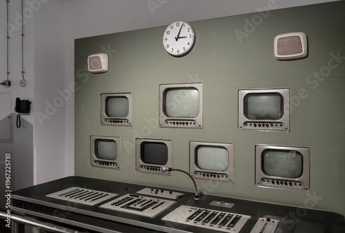 Quadro su tela Retro TV studio control room with CRT monitors and analog console