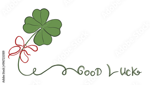 A four-leaf clover with a red bow and good luck message
