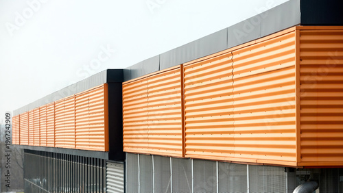 Canvastavla Architectural facade with orange cladding corrugated metal panels, large glass window of industrial or commercial building, contemporary architecture with vertical relief and material contrast