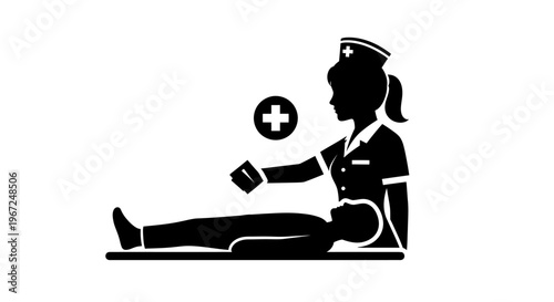 Nurse sitting on floor with tablet.
