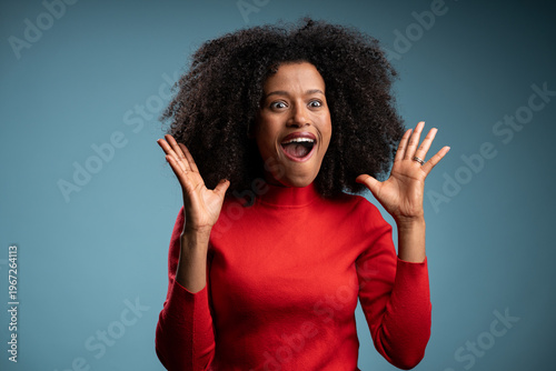 Schilderij op canvas Young African American woman over isolated background celebrating a victory