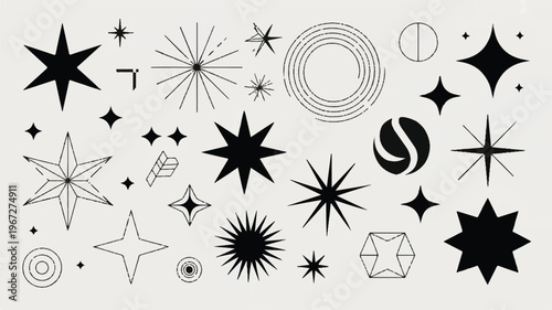 A collection of various black and white starburst shapes and designs are scattered across a plain surface in a digital illustration.