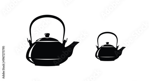 Two black teapots in varying sizes on transparent background silhouette