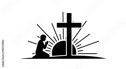 Man praying beside a cross.