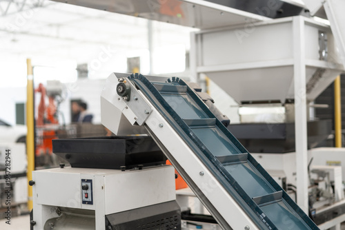 Bild auf Leinwand Industrial automated conveyor belt equipment in close-up view within a modern fa